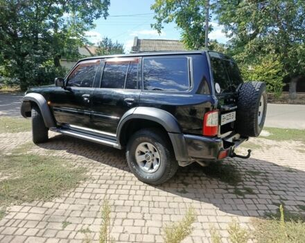 Чорний Ніссан Патрол, об'ємом двигуна 3 л та пробігом 3 тис. км за 19000 $, фото 2 на Automoto.ua