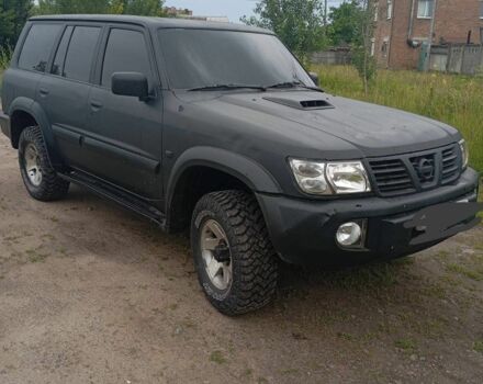 Чорний Ніссан Патрол, об'ємом двигуна 0 л та пробігом 380 тис. км за 6700 $, фото 1 на Automoto.ua