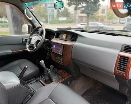 Черный Ниссан Патрол, объемом двигателя 3 л и пробегом 359 тыс. км за 18999 $, фото 11 на Automoto.ua
