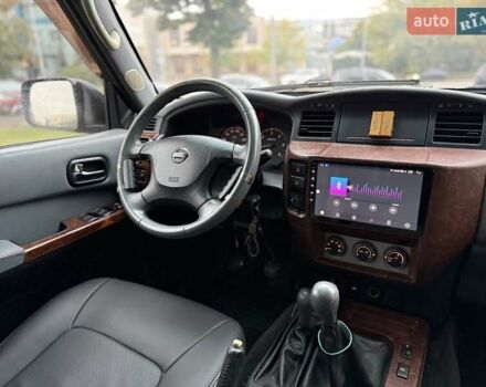 Черный Ниссан Патрол, объемом двигателя 3 л и пробегом 359 тыс. км за 18999 $, фото 9 на Automoto.ua