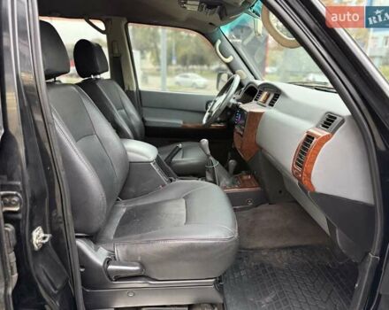 Черный Ниссан Патрол, объемом двигателя 3 л и пробегом 359 тыс. км за 18999 $, фото 10 на Automoto.ua