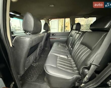 Черный Ниссан Патрол, объемом двигателя 3 л и пробегом 359 тыс. км за 18999 $, фото 16 на Automoto.ua