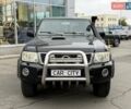 Черный Ниссан Патрол, объемом двигателя 3 л и пробегом 359 тыс. км за 18999 $, фото 1 на Automoto.ua