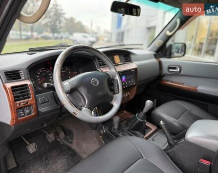 Черный Ниссан Патрол, объемом двигателя 3 л и пробегом 359 тыс. км за 18999 $, фото 14 на Automoto.ua