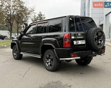 Черный Ниссан Патрол, объемом двигателя 3 л и пробегом 359 тыс. км за 18999 $, фото 4 на Automoto.ua