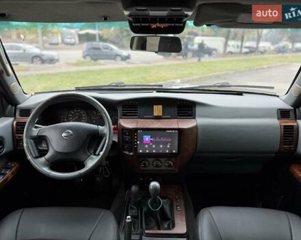 Черный Ниссан Патрол, объемом двигателя 3 л и пробегом 359 тыс. км за 18999 $, фото 8 на Automoto.ua