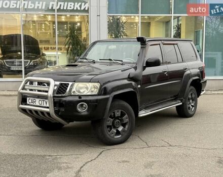 Черный Ниссан Патрол, объемом двигателя 3 л и пробегом 359 тыс. км за 18999 $, фото 2 на Automoto.ua