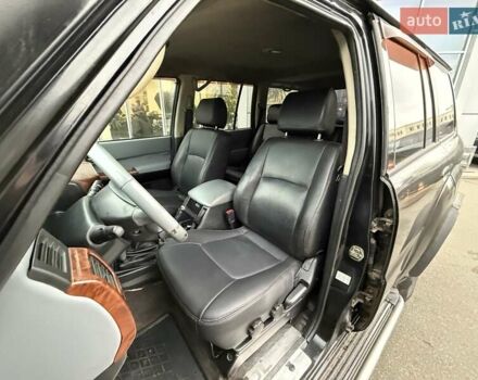 Черный Ниссан Патрол, объемом двигателя 3 л и пробегом 359 тыс. км за 18999 $, фото 15 на Automoto.ua