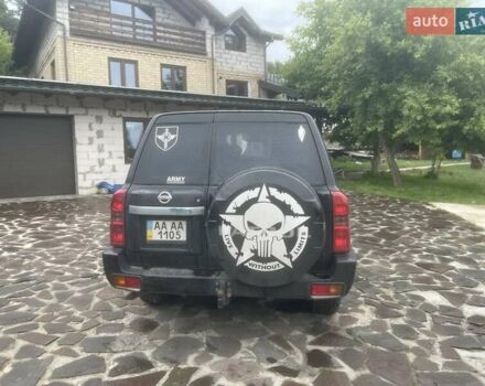 Черный Ниссан Патрол, объемом двигателя 3 л и пробегом 200 тыс. км за 21822 $, фото 2 на Automoto.ua