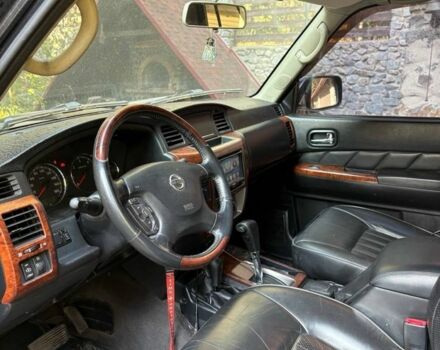 Черный Ниссан Патрол, объемом двигателя 3 л и пробегом 208 тыс. км за 20500 $, фото 5 на Automoto.ua