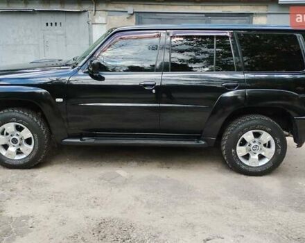 Чорний Ніссан Патрол, об'ємом двигуна 3 л та пробігом 230 тис. км за 23500 $, фото 1 на Automoto.ua