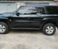 Чорний Ніссан Патрол, об'ємом двигуна 3 л та пробігом 230 тис. км за 23500 $, фото 1 на Automoto.ua