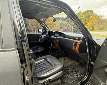 Чорний Ніссан Патрол, об'ємом двигуна 2.95 л та пробігом 300 тис. км за 31000 $, фото 10 на Automoto.ua