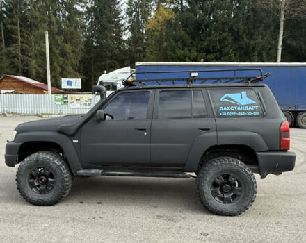 Чорний Ніссан Патрол, об'ємом двигуна 2.95 л та пробігом 300 тис. км за 31000 $, фото 6 на Automoto.ua