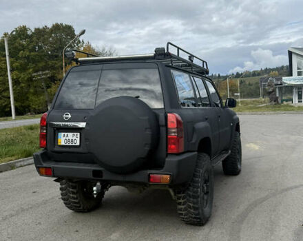 Чорний Ніссан Патрол, об'ємом двигуна 2.95 л та пробігом 300 тис. км за 31000 $, фото 3 на Automoto.ua