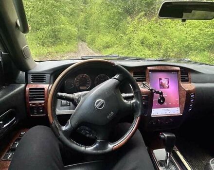 Черный Ниссан Патрол, объемом двигателя 3 л и пробегом 280 тыс. км за 22000 $, фото 1 на Automoto.ua