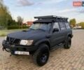 Черный Ниссан Патрол, объемом двигателя 3 л и пробегом 233 тыс. км за 3500 $, фото 1 на Automoto.ua