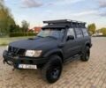 Черный Ниссан Патрол, объемом двигателя 3 л и пробегом 210 тыс. км за 2800 $, фото 1 на Automoto.ua