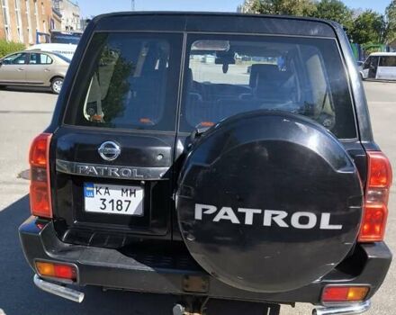 Черный Ниссан Патрол, объемом двигателя 3 л и пробегом 203 тыс. км за 21000 $, фото 5 на Automoto.ua