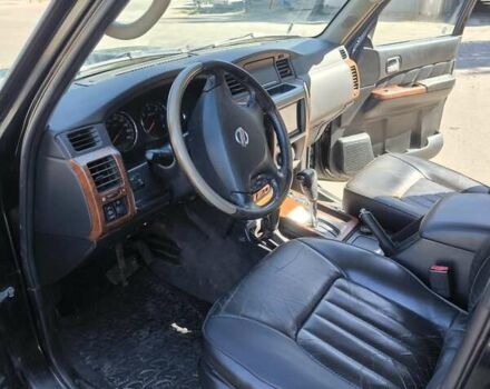 Черный Ниссан Патрол, объемом двигателя 3 л и пробегом 203 тыс. км за 21000 $, фото 8 на Automoto.ua