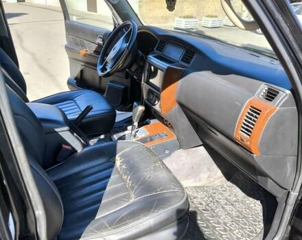 Черный Ниссан Патрол, объемом двигателя 3 л и пробегом 203 тыс. км за 21000 $, фото 9 на Automoto.ua