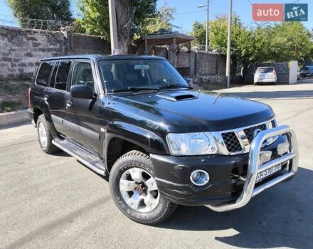 Черный Ниссан Патрол, объемом двигателя 3 л и пробегом 203 тыс. км за 21000 $, фото 2 на Automoto.ua