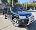 Черный Ниссан Патрол, объемом двигателя 3 л и пробегом 203 тыс. км за 21000 $, фото 2 на Automoto.ua