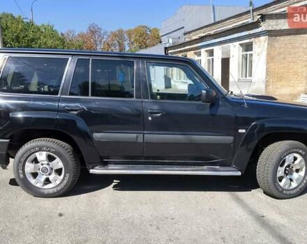 Черный Ниссан Патрол, объемом двигателя 3 л и пробегом 203 тыс. км за 21000 $, фото 3 на Automoto.ua