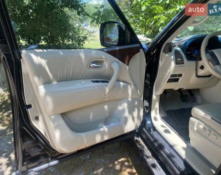 Черный Ниссан Патрол, объемом двигателя 5.6 л и пробегом 128 тыс. км за 29000 $, фото 5 на Automoto.ua