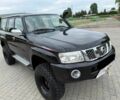 Черный Ниссан Патрол, объемом двигателя 4.8 л и пробегом 75 тыс. км за 9750 $, фото 5 на Automoto.ua