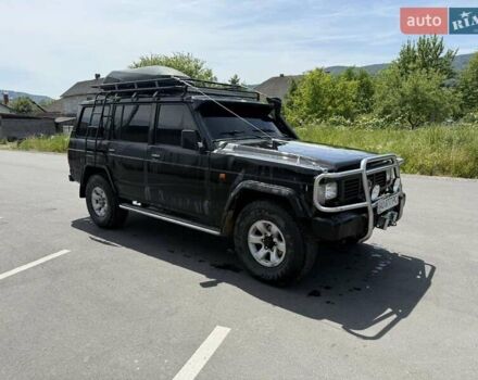 Черный Ниссан Патрол, объемом двигателя 2.8 л и пробегом 300 тыс. км за 6250 $, фото 1 на Automoto.ua