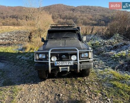 Черный Ниссан Патрол, объемом двигателя 2.8 л и пробегом 300 тыс. км за 5250 $, фото 1 на Automoto.ua