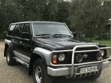 Черный Ниссан Патрол, объемом двигателя 2.8 л и пробегом 306 тыс. км за 11700 $, фото 1 на Automoto.ua