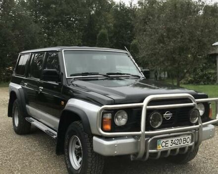 Чорний Ніссан Патрол, об'ємом двигуна 2.8 л та пробігом 306 тис. км за 12000 $, фото 1 на Automoto.ua