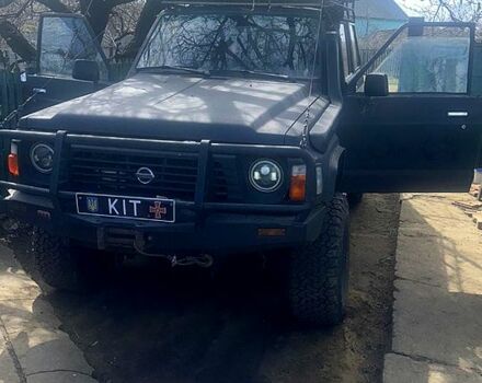 Чорний Ніссан Патрол, об'ємом двигуна 4.2 л та пробігом 0 тис. км за 7500 $, фото 1 на Automoto.ua