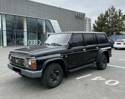 Черный Ниссан Патрол, объемом двигателя 3 л и пробегом 200 тыс. км за 10999 $, фото 1 на Automoto.ua