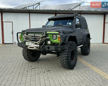 Черный Ниссан Патрол, объемом двигателя 2.8 л и пробегом 300 тыс. км за 12000 $, фото 1 на Automoto.ua