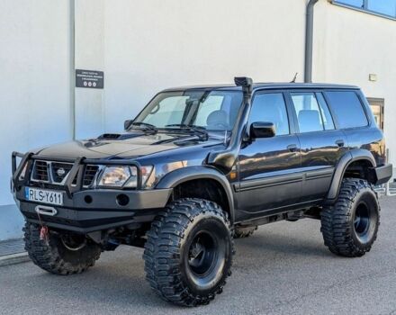Черный Ниссан Патрол, объемом двигателя 2.8 л и пробегом 133 тыс. км за 2700 $, фото 1 на Automoto.ua