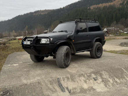 Чорний Ніссан Патрол, об'ємом двигуна 2.83 л та пробігом 307 тис. км за 14800 $, фото 1 на Automoto.ua