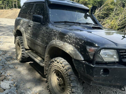 Чорний Ніссан Патрол, об'ємом двигуна 2.83 л та пробігом 298 тис. км за 16000 $, фото 1 на Automoto.ua