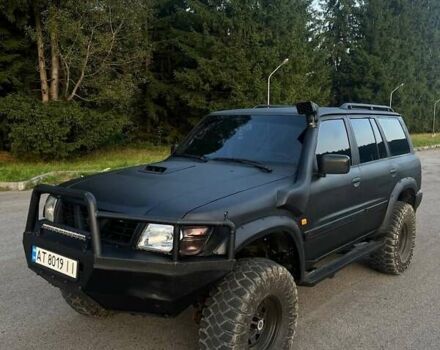 Чорний Ніссан Патрол, об'ємом двигуна 2.95 л та пробігом 340 тис. км за 10500 $, фото 1 на Automoto.ua