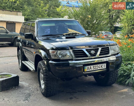 Чорний Ніссан Патрол, об'ємом двигуна 2.95 л та пробігом 400 тис. км за 13750 $, фото 1 на Automoto.ua