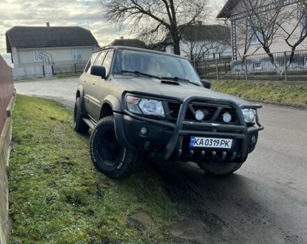 Черный Ниссан Патрол, объемом двигателя 3 л и пробегом 330 тыс. км за 6800 $, фото 1 на Automoto.ua