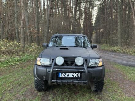 Черный Ниссан Патрол, объемом двигателя 3 л и пробегом 251 тыс. км за 9000 $, фото 1 на Automoto.ua