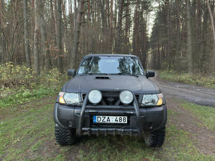 Черный Ниссан Патрол, объемом двигателя 3 л и пробегом 251 тыс. км за 9000 $, фото 1 на Automoto.ua