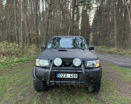 Черный Ниссан Патрол, объемом двигателя 3 л и пробегом 251 тыс. км за 9000 $, фото 1 на Automoto.ua