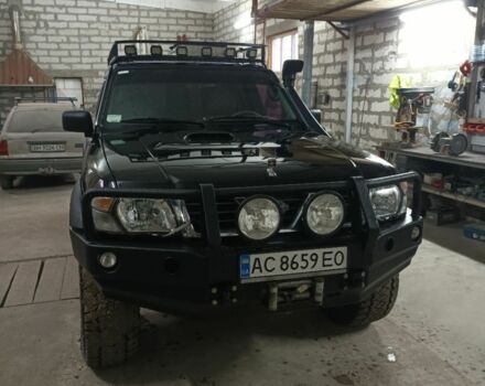 Черный Ниссан Патрол, объемом двигателя 3 л и пробегом 336 тыс. км за 14700 $, фото 1 на Automoto.ua