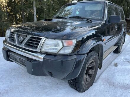 Чорний Ніссан Патрол, об'ємом двигуна 3 л та пробігом 200 тис. км за 8300 $, фото 1 на Automoto.ua