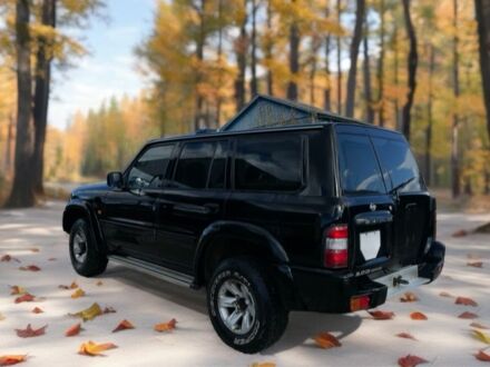 Чорний Ніссан Патрол, об'ємом двигуна 3 л та пробігом 350 тис. км за 7999 $, фото 1 на Automoto.ua