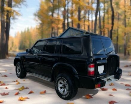 Черный Ниссан Патрол, объемом двигателя 3 л и пробегом 350 тыс. км за 7999 $, фото 1 на Automoto.ua